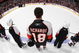 PHILADELPHIA - MARCH 5: Mike Richards #18 of the Philadelphia Flyers stands at attention during the national anthem prior to his game against the Calgary Flames at the Wachovia Center March 5, 2009 in Philadelphia, Pennsylvania. The Flames defeated the Flyers 5-1. (Photo by Bruce Bennett/Getty Images)
