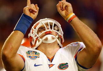 MIAMI - JANUARY 08:  Quarterback Tim Tebow #15 of the Florida Gators celebrates after a touchdown in the fourth quarter against the Oklahoma Sooners in the FedEx BCS National Championship Game at Dolphin Stadium on January 8, 2009 in Miami, Florida.  (Photo by Eliot J. Schechter/Getty Images)