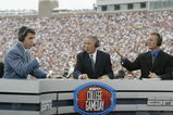 TALLAHASSEE, FL - OCTOBER 26:  ESPN College GameDay announcers (l to r) Chris Fowler, Lee Corso and Kirk Herbstreit comment during the NCAA football game between Notre Dame and Florida State at Doak Campbell Stadium on October 26, 2002 in Tallahassee, Florida.  The Notre Dame Fighting Irish defeated the Florida State Seminoles 34-24.  (Photo by Craig Jones/Getty Images)