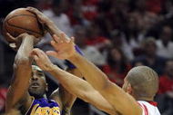 HOUSTON - MAY 14:  Guard Kobe Bryant #24 of the Los Angeles Lakers takes a shot against Shane Battier #31 of the Houston Rockets in Game Six of the Western Conference Semifinals during the 2009 NBA Playoffs at Toyota Center on May 14, 2009 in Houston, Texas. NOTE TO USER: User expressly acknowledges and agrees that, by downloading and or using this photograph, User is consenting to the terms and conditions of the Getty Images License Agreement.  (Photo by Ronald Martinez/Getty Images)