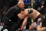 DALLAS - SEPTEMBER 19:  UFC fighter Rich Franklin (R) gets knocked out by UFC fighter Vitor Belfort with referee Yves Lavigne (L) protecting him during their Catch weight bout at UFC 103: Franklin vs. Belfort at the American Airlines Center on September 19, 2009 in Dallas, Texas.  (Photo by Jon Kopaloff/Getty Images)