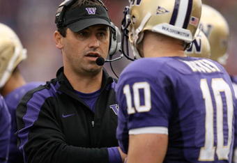 SEATTLE - SEPTEMBER 19:  Head coach Steve Sarkisian of the Washington Huskies talks with quarterback Jake Locker #10 during the game against the USC Trojans on September 19, 2009 at Husky Stadium in Seattle, Washington. The Huskies defeated the Trojans 16-13. (Photo by Otto Greule Jr/Getty Images)