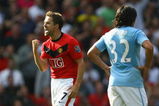 MANCHESTER, ENGLAND - SEPTEMBER 20:  Michael Owen of Manchester United celebrates scoring the winning goal in injury time during the Barclays Premier League match between Manchester United and Manchester City at Old Trafford on September 20, 2009 in Manchester, England.  (Photo by Alex Livesey/Getty Images)
