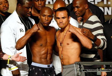 LAS VEGAS - SEPTEMBER 18:  (L-R) Nate Jones, co-trainer for Floyd Mayweather Jr., boxers Floyd Mayweather Jr., Juan Manuel Marquez and Bernard Hopkins appear during the official weigh-in for Mayweather and Marquez at the MGM Grand Garden Arena September 18, 2009 in Las Vegas, Nevada. The two will fight at the MGM on September 19.  (Photo by Ethan Miller/Getty Images)