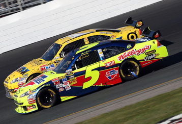 LOUDON, NH - SEPTEMBER 20: Mark Martin, driver of the #5 CARQUEST/Kellogg's Chevrolet, and Martin Truex Jr, driver of the #1 Rain X Chevrolet, round turn four during the NASCAR Sprint Cup Series Sylvania 300 at the New Hampshire Motor Speedway on September 20, 2009 in Loudon, New Hampshire.  (Photo by Elsa/Getty Images for NASCAR)