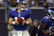EAST RUTHERFORD, NJ - AUGUST 29:  Eli Manning #10 of the New York Giants looks to throw a pass against the New York Jets on August 29, 2009 at Giants Stadium in East Rutherford, New Jersey.  (Photo by Jim McIsaac/Getty Images)