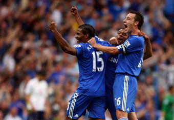 LONDON, ENGLAND - SEPTEMBER 20:  Florent Malouda of Chelsea, Ashley Cole of Chelsea and Frank Lampard of Chelsea celebrates after Chelsea scored during the Barclays Premier League match between Chelsea and Tottenham Hotspur at Stamford Bridge on September 20, 2009 in London, England.  (Photo by Jamie McDonald/Getty Images)