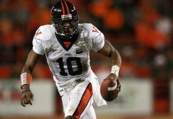 CORAL GABLES, FL - NOVEMBER 10:  Quarterback Jameel Sewell #10 of the Virginia Cavaliers scrambles against the Miami Hurricanes at the Orange Bowl on November 10, 2007 in Coral Gables, Florida.  (Photo by Doug Benc/Getty Images)