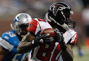 DETROIT, MI - AUGUST 15: Wide receiver Marty Booker #80 of the Atlanta Falcons runs with the football after a pass reception against the Detroit Lions at Ford Field on August 15, 2009 in Detroit, Michigan. (Photo by Scott Boehm/Getty Images)