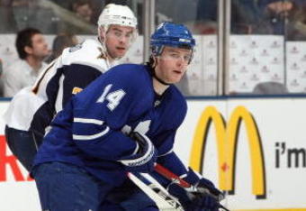 TORONTO - APRIL 8: Matt Stajan #14 of the Toronto Maple Leafs skates against the Buffalo Sabres during their NHL game at the Air Canada Centre on April 8, 2009 in Toronto, Ontario. (Photo by: Dave Sandford/Getty Images)