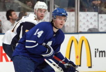 TORONTO - APRIL 8: Matt Stajan #14 of the Toronto Maple Leafs skates against the Buffalo Sabres during their NHL game at the Air Canada Centre on April 8, 2009 in Toronto, Ontario. (Photo by: Dave Sandford/Getty Images)