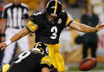 PITTSBURGH, PA - SEPTEMBER 10: Jeff Reed #3 of the Pittsburgh Steelers kicks the winning field goal as Daniel Sepulveda #9 holds against the Tennessee Titans at Heinz Field on September 10, 2009 in Pittsburgh, Pennsylvania. The Steelers defeated the Titans 13-10 in overtime. (Photo by Scott Boehm/Getty Images)