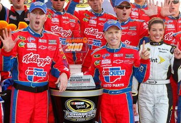 LOUDON, NH - SEPTEMBER 20:  Mark Martin, driver of the #5 CARQUEST/Kellogg's Chevrolet, celebrates with the trophy in victory lane after winning the NASCAR Sprint Cup Series Sylvania 300 at the New Hampshire Motor Speedway on September 20, 2009 in Loudon, New Hampshire.  (Photo by Geoff Burke/Getty Images for NASCAR)