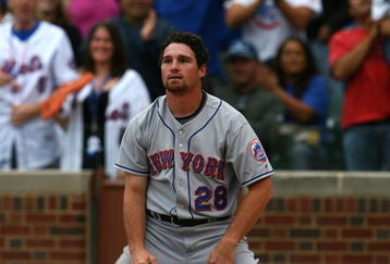 CHICAGO - AUGUST 28: Daniel Murphy #28 of the New York Mets reacts after being tagged out at the plate by Geovany Soto of the Chicago Cubs on August 28, 2009 at Wrigley Field in Chicago, Illinois. The Cubs defeated the Mets 5-2. (Photo by Jonathan Daniel/Getty Images) 