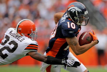 DENVER - SEPTEMBER 20:  Wide reciever Jabar Gaffney #10 of the Denver Broncos makes a reception and as Brandon McDonald #22 of the Cleveland Browns defends during NFL action at Invesco Field at Mile High on September 20, 2009 in Denver, Colorado. The Broncos defeated the Browns 27-6.  (Photo by Doug Pensinger/Getty Images)