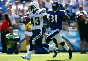 SAN DIEGO , CA - SEPTEMBER 20:  Darren Sproles #43 of the San Diego Chargers is pursued by Fabian Washington #31 of the Baltimore Ravens before scoring a touchdown in the first half at Qualcomm Stadium on September 20, 2009 in San Diego, California. The Ravens defeated the Chargers 31-26.  (Photo by Jeff Gross/Getty Images)