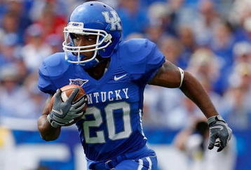 LEXINGTON, KY - SEPTEMBER 19: Derrick Locke #20 of the Kentucky Wildcats returns a kickoff for a touchdown during the game against the Louisville Cardinals at Commonwealth Stadium on September 19, 2009 in Lexington, Kentucky.  (Photo by Andy Lyons/Getty Images)