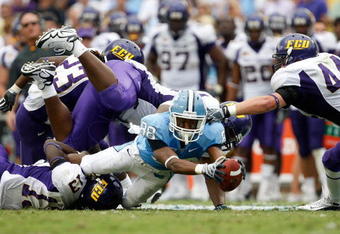 CHAPEL HILL, NC - SEPTEMBER 19:  Erik Highsmith #88 of the North Carolina Tar Heels stretches out for a first down against the East Carolina Pirates at Kenan Stadium on September 19, 2009 in Chapel Hill, North Carolina.  (Photo by Streeter Lecka/Getty Images)