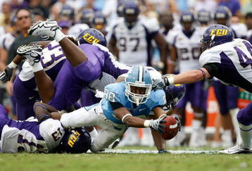 CHAPEL HILL, NC - SEPTEMBER 19:  Erik Highsmith #88 of the North Carolina Tar Heels stretches out for a first down against the East Carolina Pirates at Kenan Stadium on September 19, 2009 in Chapel Hill, North Carolina.  (Photo by Streeter Lecka/Getty Images)