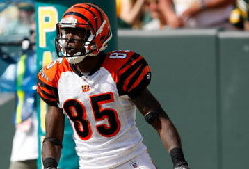 GREEN BAY, WI - SEPTEMBER 20: Wide receiver Chad Ochocinco #85 of the Cincinnati Bengals runs with the football for a touchdown after a pass reception against the Green Bay Packers at Lambeau Field on September 20, 2009 in Green Bay, Wisconsin. The Bengals defeated the Packers 31-24. (Photo by Scott Boehm/Getty Images)