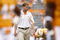 KNOXVILLE, TN - SEPTEMBER 12: Lane Kiffin, head coach of the Tennessee Volunteers watches his team before a game against the UCLA Bruins on September 12, 2009 at Neyland Stadium in Knoxville, Tennessee. UCLA beat Tennessee 19-15. (Photo by Joe Murphy/Getty Images)