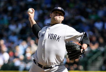 SEATTLE - SEPTEMBER 20:  Starting pitcher Joba Chamberlain #62 of the New York Yankees pitches against the Seattle Mariners on September 20, 2009 at Safeco Field in Seattle, Washington. (Photo by Otto Greule Jr/Getty Images)