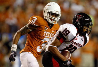 AUSTIN, TX - SEPTEMBER 19:  Wide receiver Lyle Leong #19 of the Texas Tech Red Raiders runs the ball past Curtis Brown #3 of the Texas Longhorns at Darrell K Royal-Texas Memorial Stadium on September 19, 2009 in Austin, Texas.  (Photo by Ronald Martinez/Getty Images)