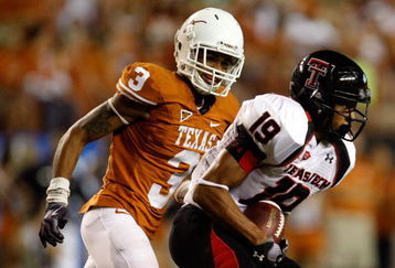 AUSTIN, TX - SEPTEMBER 19:  Wide receiver Lyle Leong #19 of the Texas Tech Red Raiders runs the ball past Curtis Brown #3 of the Texas Longhorns at Darrell K Royal-Texas Memorial Stadium on September 19, 2009 in Austin, Texas.  (Photo by Ronald Martinez/Getty Images)