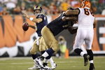 CINCINNATI, OH - AUGUST 27:  Quarterback Brock Berlin #13 of the St. Louis Rams looks for an open receiver during the preseason game against the Cincinnati Bengals at Paul Brown Stadium on August 27, 2009 in Cincinnati, Ohio. (Photo by Andy Lyons/Getty Images)