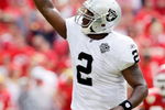 KANSAS CITY, MO - SEPTEMBER 20:  Quarterback JaMarcus Russell #2 of the Oakland Raiders celebrates after handing off for a touchdown in the final minutes of the 4th quarter during the Raiders' 13-10 victory over the Kansas City Chiefs during the game at Arrowhead Stadium on September 20, 2009 in Kansas City, Missouri.  (Photo by Jamie Squire/Getty Images)