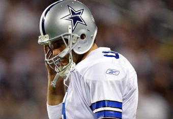 ARLINGTON, TX - SEPTEMBER 20:  Quarterback Tony Romo #9 of the Dallas Cowboys walks off the field during play against the New York Giants at Cowboys Stadium on September 20, 2009 in Arlington, Texas.  (Photo by Ronald Martinez/Getty Images)