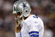 ARLINGTON, TX - SEPTEMBER 20:  Quarterback Tony Romo #9 of the Dallas Cowboys walks off the field during play against the New York Giants at Cowboys Stadium on September 20, 2009 in Arlington, Texas.  (Photo by Ronald Martinez/Getty Images)