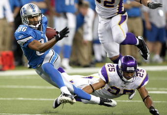 DETROIT - SEPTEMBER 20: Wide receiver Dennis Northcutt #86 of the Detroit Lions gets away from safty Tyrell Johnson #25 of the Minnesota Vikings at Ford Field on September 20, 2009 in Detroit, Michigan. The Vikings won 27-13. (Photo by Stephen Dunn/Getty Images)