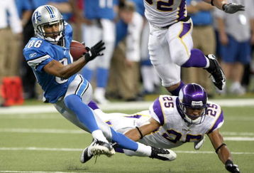 DETROIT - SEPTEMBER 20: Wide receiver Dennis Northcutt #86 of the Detroit Lions gets away from safty Tyrell Johnson #25 of the Minnesota Vikings at Ford Field on September 20, 2009 in Detroit, Michigan. The Vikings won 27-13. (Photo by Stephen Dunn/Getty Images)