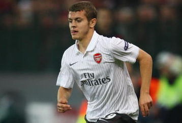 LIEGE, BELGIUM - SEPTEMBER 16:  Jack Wilshere of Arsenal runs with the ball during the UEFA Champions League Group H match between Standard Liege and Arsenal at the Sclessin Stadium on September 16, 2009 in Liege, Belgium.  (Photo by Jamie McDonald/Getty Images)
