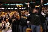 BOSTON - MAY 14:  Boston Bruins fans cheer in the first period against the Carolina Hurricanes during Game Seven of the Eastern Conference Semifinal Round of the 2009 Stanley Cup Playoffs on May 14, 2009 at the TD Banknorth Garden in Boston, Massachusetts. The Hurricanes defeated the Bruins 3-2 in overtime.  (Photo by Elsa/Getty Images)