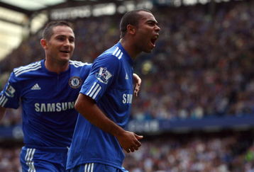 LONDON, ENGLAND - SEPTEMBER 20:  Ashley Cole of Chelsea celebrates scoring the first goal during the Barclays Premier League match between Chelsea and Tottenham Hotspur at Stamford Bridge on September 20, 2009 in London, England.  (Photo by Jamie McDonald/Getty Images)