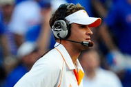 GAINESVILLE, FL - SEPTEMBER 19: Head coach Lane Kiffin of the Tennessee Volunteers watches the action during the game against the Florida Gators at Ben Hill Griffin Stadium on September 19, 2009 in Gainesville, Florida.  (Photo by Sam Greenwood/Getty Images)