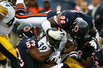 CHICAGO - SEPTEMBER 20: (L-R) Nick Roach #53, Alex Brown #96 and Danieal Manning #38 of the Chicago Bears gang tackle Willie Parker #39 of the Pittsburgh Steelers at Soldier Field on September 20, 2009 in Chicago, Illinois. (Photo by Jonathan Daniel/Getty Images)