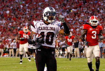 ATHENS, GA - SEPTEMBER 12:  Tailback Brian Maddox #10 of the South Carolina Gamecocks rushes in a touchdown against the Georgia Bulldogs at Sanford Stadium on September 12, 2009 in Athens, Georgia.  (Photo by Kevin C. Cox/Getty Images)