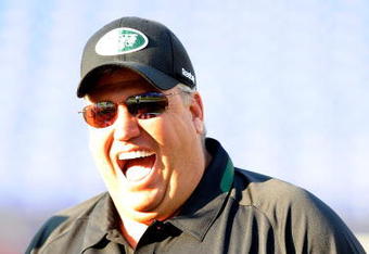 BALTIMORE - AUGUST 24:  Head coach Rex Ryan (R) of the New York Jets talks with players before a game against the Baltimore Ravens at M&T Bank Stadium on August 24, 2009 in Baltimore, Maryland.  (Photo by Greg Fiume/Getty Images)