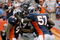 DENVER - SEPTEMBER 20:  Defensive end Elvis Dumervil #92 (L) of the Denver Broncos is congratulated by his teammates after he sacked quarterback Brady Quinn #10 of the Cleveland Browns in the fourth quarter during NFL action at Invesco Field at Mile High on September 20, 2009 in Denver, Colorado. The Broncos defeated the Browns 27-6.  (Photo by Doug Pensinger/Getty Images)