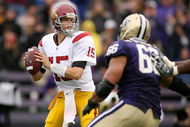SEATTLE - SEPTEMBER 19:  Quarterback Aaron Corp #15 of the USC Trojans looks to pass against the Washington Huskies on September 19, 2009 at Husky Stadium in Seattle, Washington. (Photo by Otto Greule Jr/Getty Images)