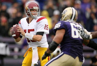 SEATTLE - SEPTEMBER 19:  Quarterback Aaron Corp #15 of the USC Trojans looks to pass against the Washington Huskies on September 19, 2009 at Husky Stadium in Seattle, Washington. (Photo by Otto Greule Jr/Getty Images)
