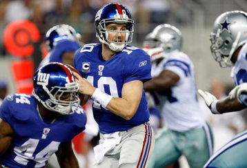 ARLINGTON, TX - SEPTEMBER 20:  Quarterback Eli Manning #10 of the New York Giants drops back to pass against the Dallas Cowboys at Cowboys Stadium on September 20, 2009 in Arlington, Texas.  (Photo by Ronald Martinez/Getty Images)