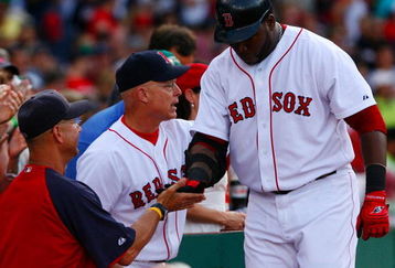 BOSTON - AUGUST 22:  Manager Terry Francona greets David Ortiz #34 of the Boston Red Sox in the dugout after Ortiz, hit a solo home run, in the fitfh inning against pitcher A.J. Burnett #34 (not pictured) of the New York Yankees at Fenway Park on August 22, 2009 in Boston, Massachusetts. (Photo by Jim Rogash/Getty Images)