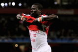 LONDON, ENGLAND - AUGUST 26:  Emmanuel  Eboue of Arsenal celebrates after scoring his team's second goal during the UEFA Champions League 2nd qualifying round 2nd leg match between Arsenal and Celtic at the Emirates Stadium on August 26, 2009 in London, England.  (Photo by Shaun Botterill/Getty Images)