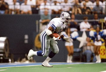 15 Sep 1997:  Running back Herschel Walker of the Dallas Cowboys moves the ball during a game against the Philadelphia Eagles at Texas Stadium in Irving, Texas.  The Cowboys won the game, 21-20. Mandatory Credit: Stephen Dunn  /Allsport