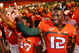 FORT LAUDERDALE, FL - SEPTEMBER 17: Quarterback Jacory Harris #12 of the Miami Hurricanes celebrates after defeating the Georgia Tech Yellow Jackets at Land Shark Stadium on September 17, 2009 in Fort Lauderdale, Florida. Miami defeated Georgia Tech 33-17. (Photo by Doug Benc/Getty Images)