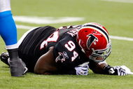 ATLANTA - SEPTEMBER 20:  Peria Jerry #94 of the Atlanta Falcons lays on the field after being injured against the Carolina Panthers at Georgia Dome on September 20, 2009 in Atlanta, Georgia.  (Photo by Kevin C. Cox/Getty Images)